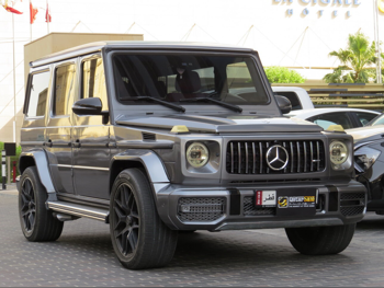 مرسيدس - بنز جي - كلاس 63 اي ام جي 2012 اوتوماتيك 161,000 كم 8 سلندر دفع رباعي اس يو في رمادي