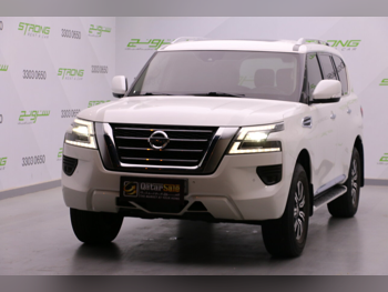 Nissan  Patrol  Titanium  2020  Automatic  175,000 Km  6 Cylinder  Four Wheel Drive (4WD)  SUV  White