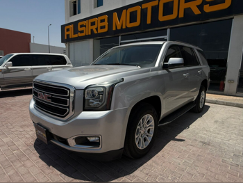 GMC  Yukon  SLE  2016  Automatic  184,000 Km  8 Cylinder  Rear Wheel Drive (RWD)  SUV  Gold