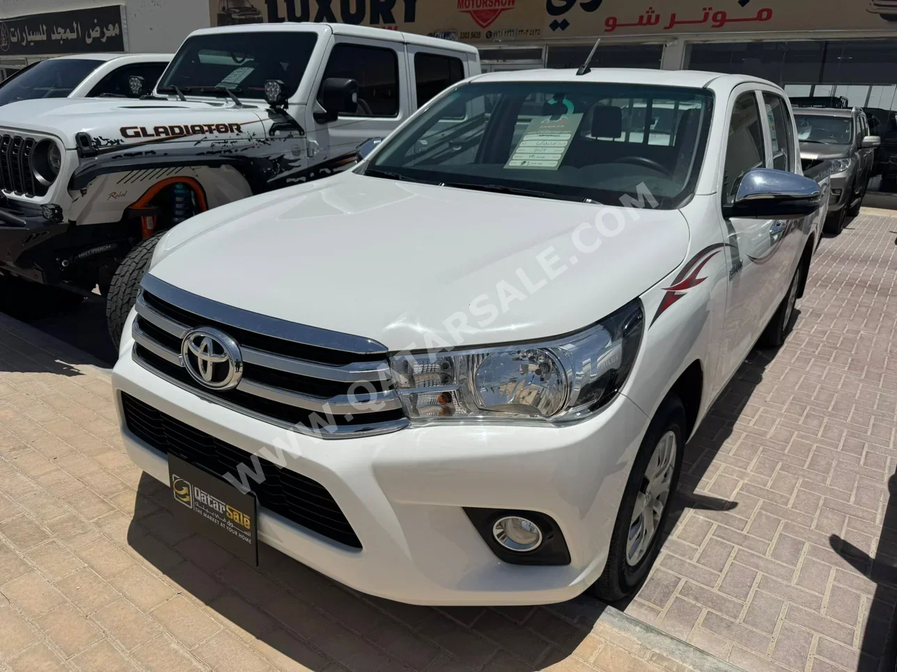 Toyota  Hilux  2025  Automatic  18,000 Km  4 Cylinder  Rear Wheel Drive (RWD)  Pick Up  White  With Warranty