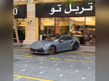 Porsche  911  Turbo  2024  Automatic  6,100 Km  6 Cylinder  Rear Wheel Drive (RWD)  Coupe / Sport  Gray