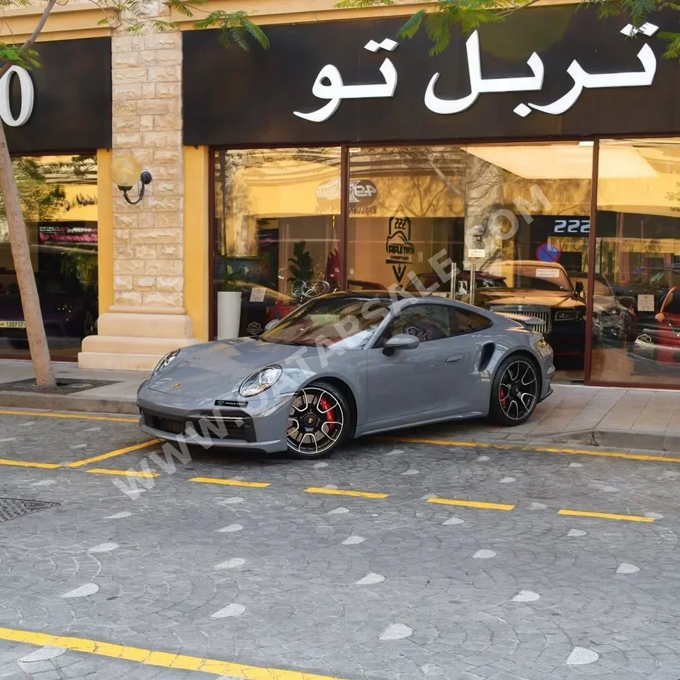 بورش 911 توربو 2024 اوتوماتيك 6,100 كم 6 سلندر دفع خلفي كوبيه \ سبورت رمادي