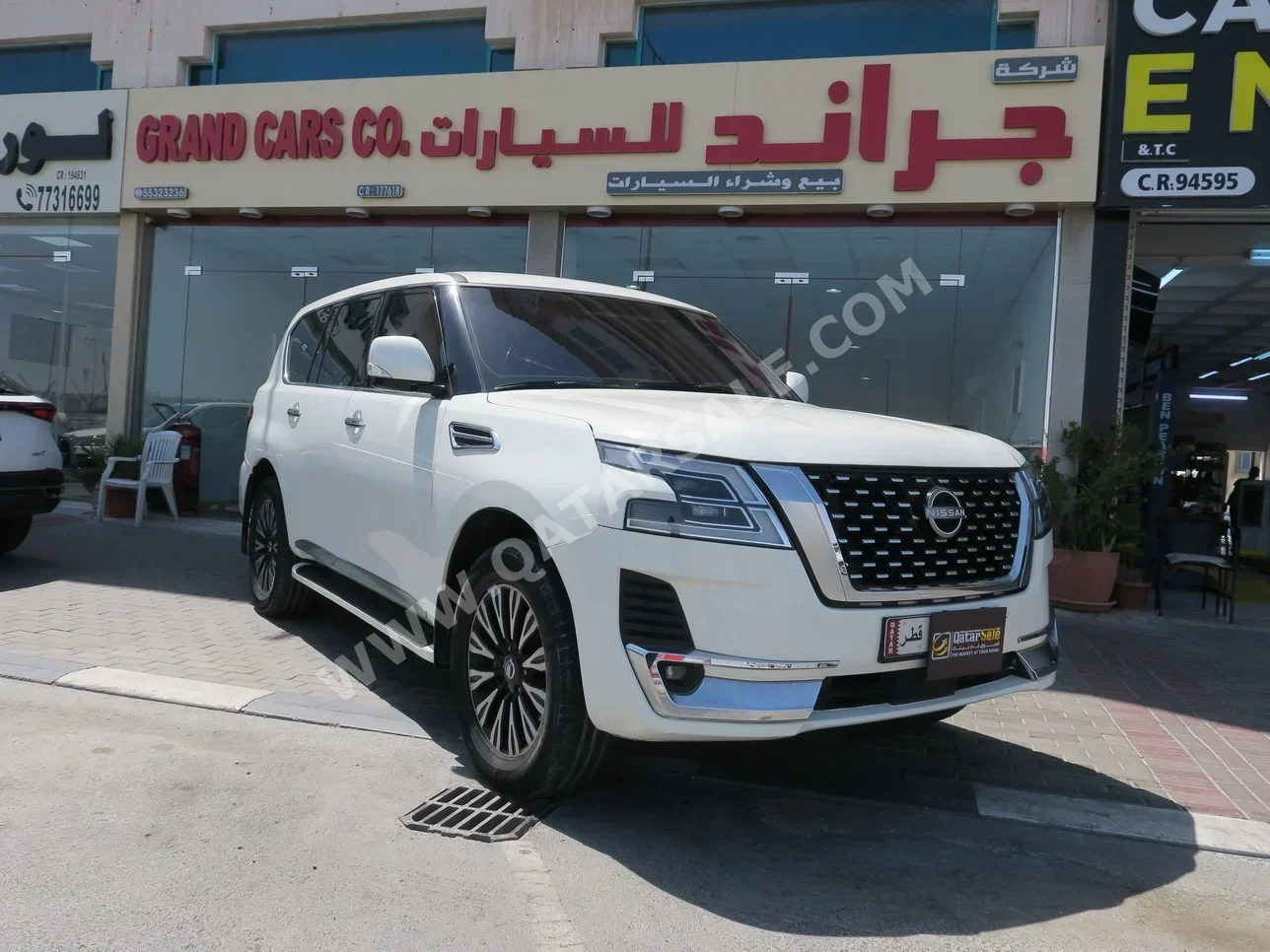 نيسان باترول اس اي 2012 اوتوماتيك 260,000 كم 8 سلندر دفع رباعي اس يو في أبيض