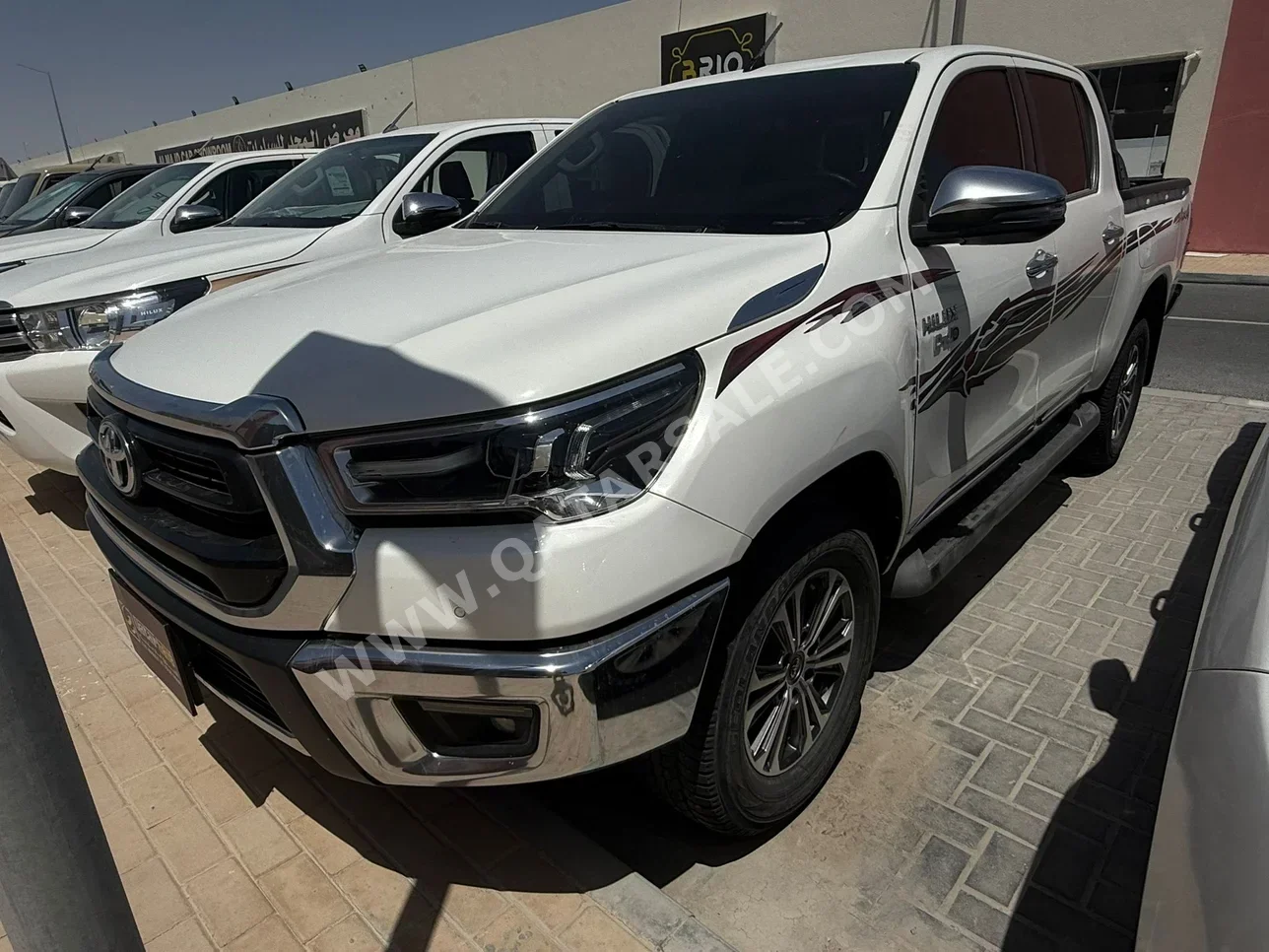 Toyota  Hilux  SR5  2024  Automatic  100,000 Km  4 Cylinder  Four Wheel Drive (4WD)  Pick Up  White
