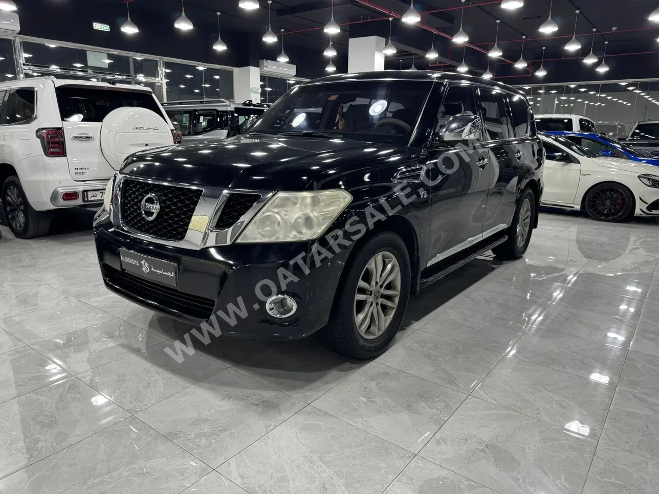 نيسان باترول ال اي 2012 اوتوماتيك 266,000 كم 8 سلندر دفع رباعي اس يو في أسود
