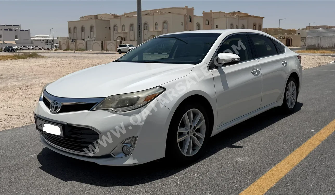 تويوتا أفالون 2013 اوتوماتيك 155,000 كم 4 سلندر سحب امامي سيدان أبيض