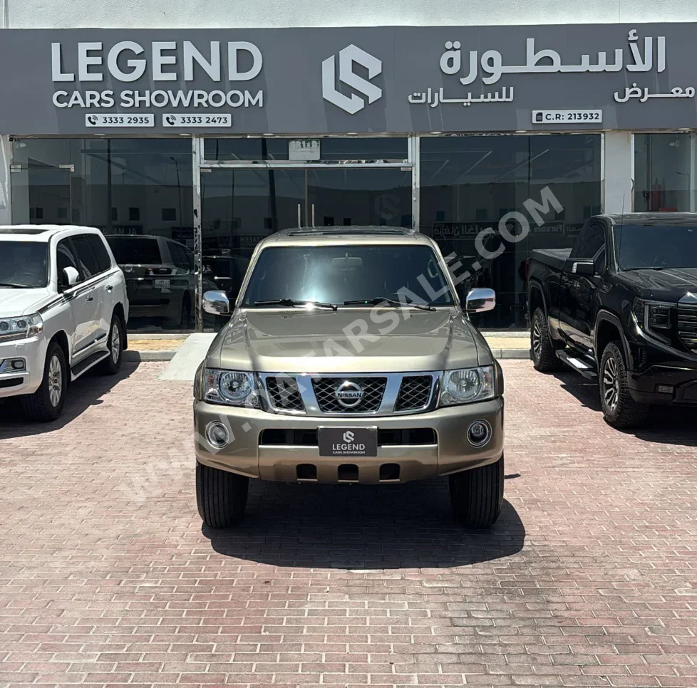 نيسان باترول سوبر سفاري 2020 عادي 102,000 كم 6 سلندر دفع رباعي اس يو في ذهبي