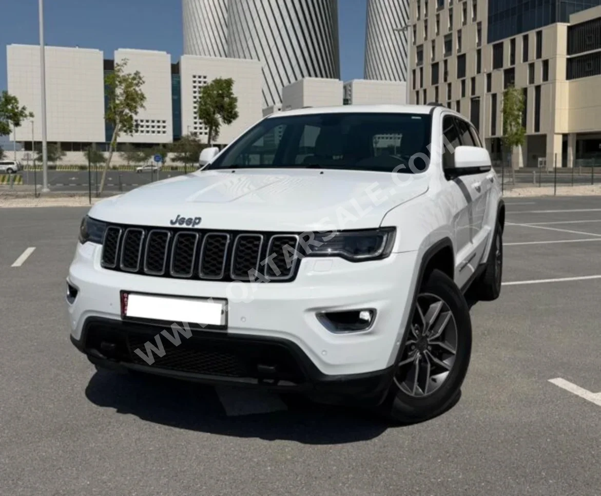 Jeep  Grand Cherokee  Laredo  2019  Automatic  99,000 Km  6 Cylinder  Four Wheel Drive (4WD)  SUV  White