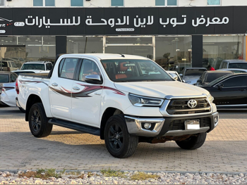Toyota  Hilux  2023  Automatic  107,000 Km  4 Cylinder  Four Wheel Drive (4WD)  Pick Up  White