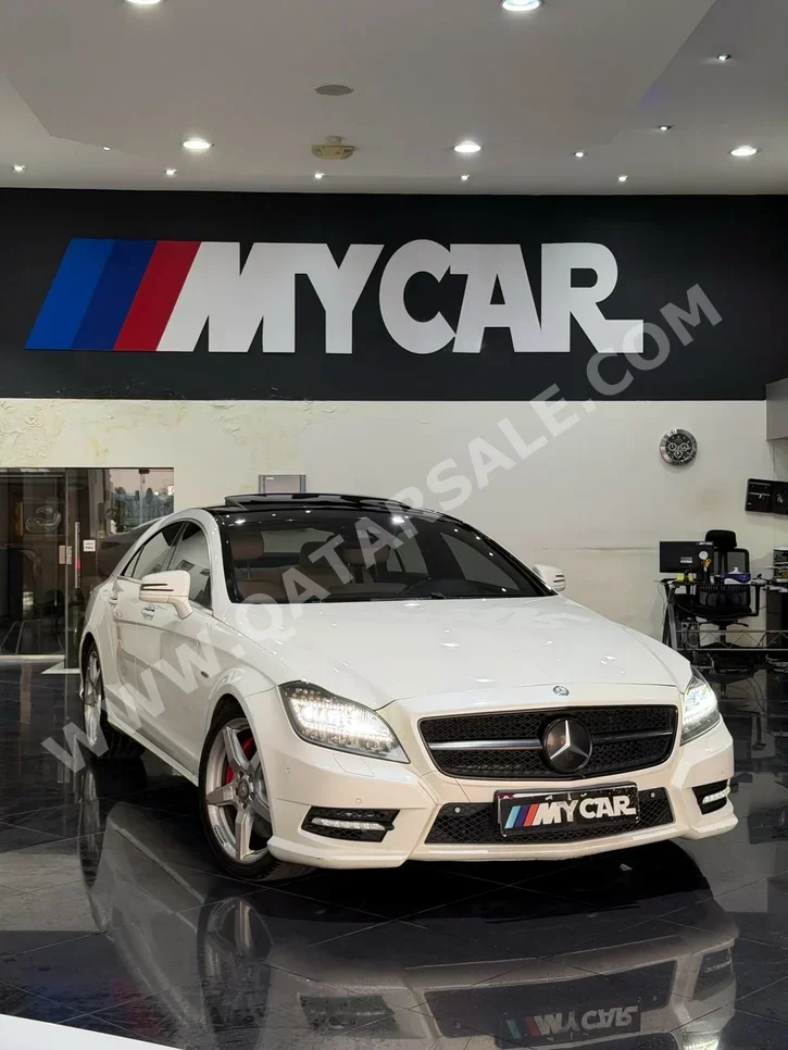 مرسيدس - بنز سي ال اس 500 AMG 2014 اوتوماتيك 206,000 كم 8 سلندر سحب امامي سيدان أبيض