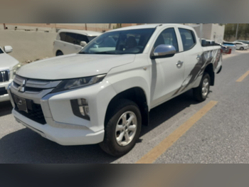 Mitsubishi L 200 2019 Manual 194,000 Km 4 Cylinder Rear Wheel Drive (RWD) Pick Up White