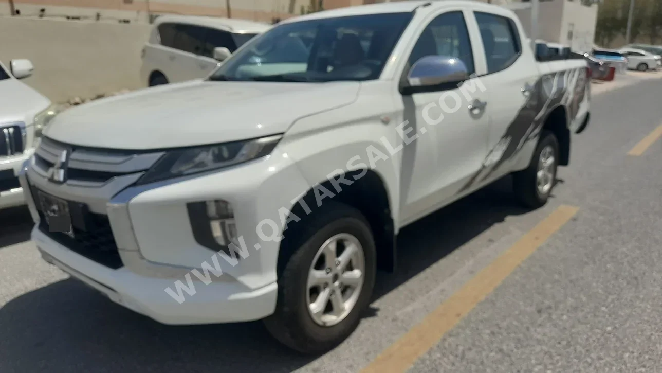 ميتسوبيشي  ال 200  2010  عادي  194,000 كم  4 سلندر  دفع خلفي  بيكب  أبيض