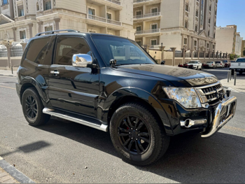 ميتسوبيشي باجيرو GLS 2016 اوتوماتيك 179,800 كم 6 سلندر دفع رباعي اس يو في أسود