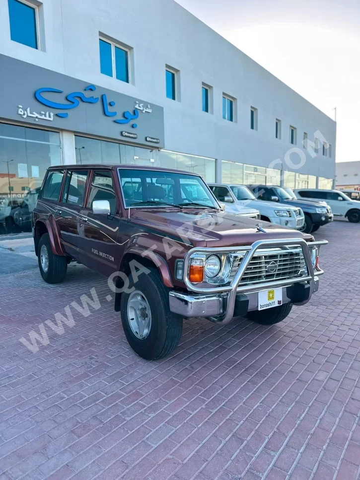 Nissan  Patrol  GL  1997  Manual  578,000 Km  6 Cylinder  Rear Wheel Drive (RWD)  SUV  Red