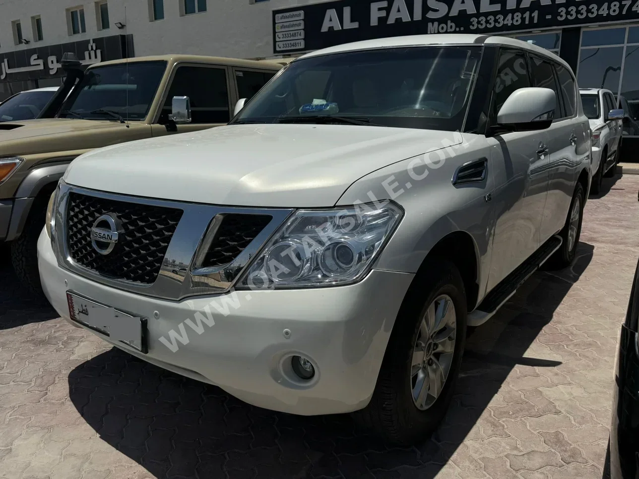 Nissan Patrol SE 2012 Automatic 299,000 Km 8 Cylinder Four Wheel Drive (4WD) SUV White