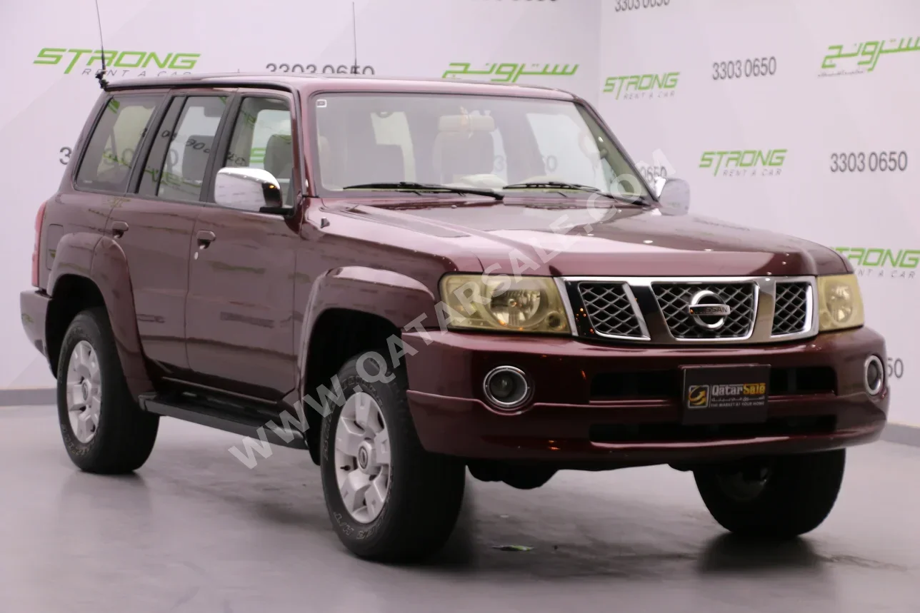نيسان  باترول  سوبر سفاري  2006  اوتوماتيك  181,000 كم  6 سلندر  دفع رباعي  اس يو في  عنابي