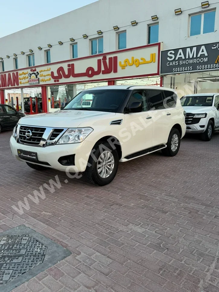 نيسان  باترول  اس اي  2018  اوتوماتيك  206,000 كم  6 سلندر  دفع رباعي  اس يو في  أبيض