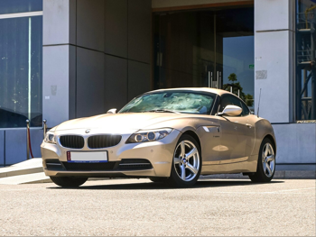 BMW  Z-Series  4 20i  2013  Automatic  99,000 Km  4 Cylinder  Rear Wheel Drive (RWD)  Convertible  Gold