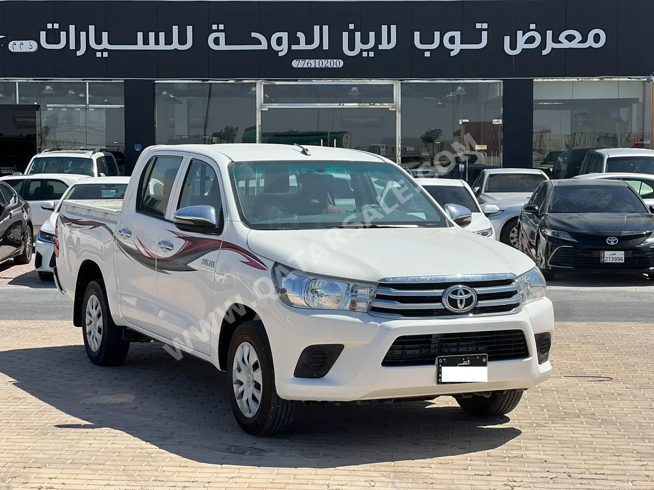 تويوتا هاي لوكس 2023 عادي 205,000 كم 4 سلندر دفع خلفي بيكب أبيض