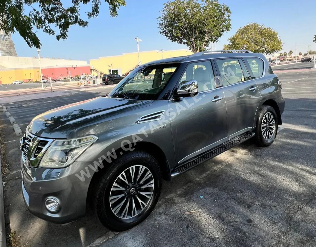 Nissan  Patrol  Platinum  2015  Automatic  144,000 Km  8 Cylinder  Four Wheel Drive (4WD)  SUV  Gray