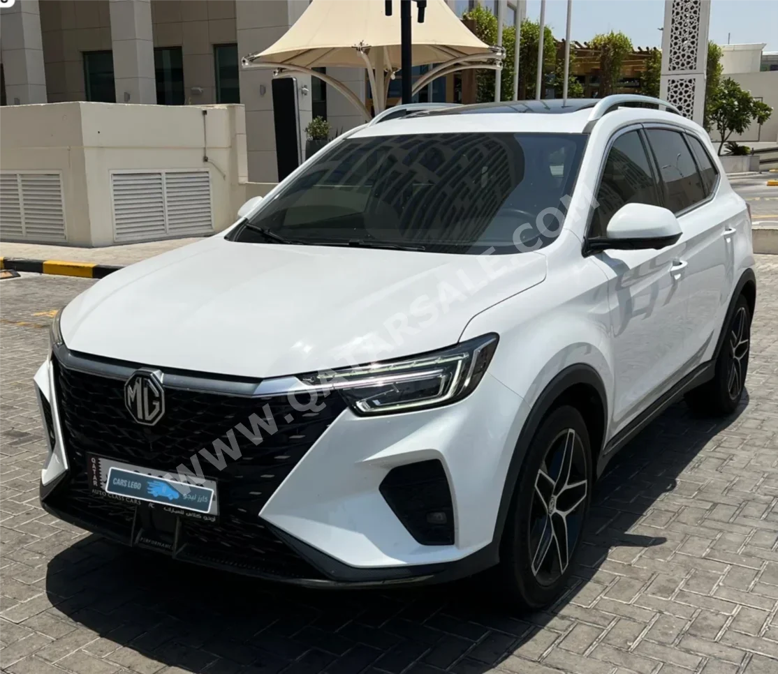 ام جي ار اكس 5 توربو 2025 اوتوماتيك 9,000 كم 4 سلندر دفع رباعي اس يو في أبيض لؤلؤي تحت الضمان