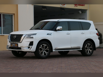Nissan Patrol SE 2013 Automatic 430,000 Km 8 Cylinder Four Wheel Drive (4WD) SUV White
