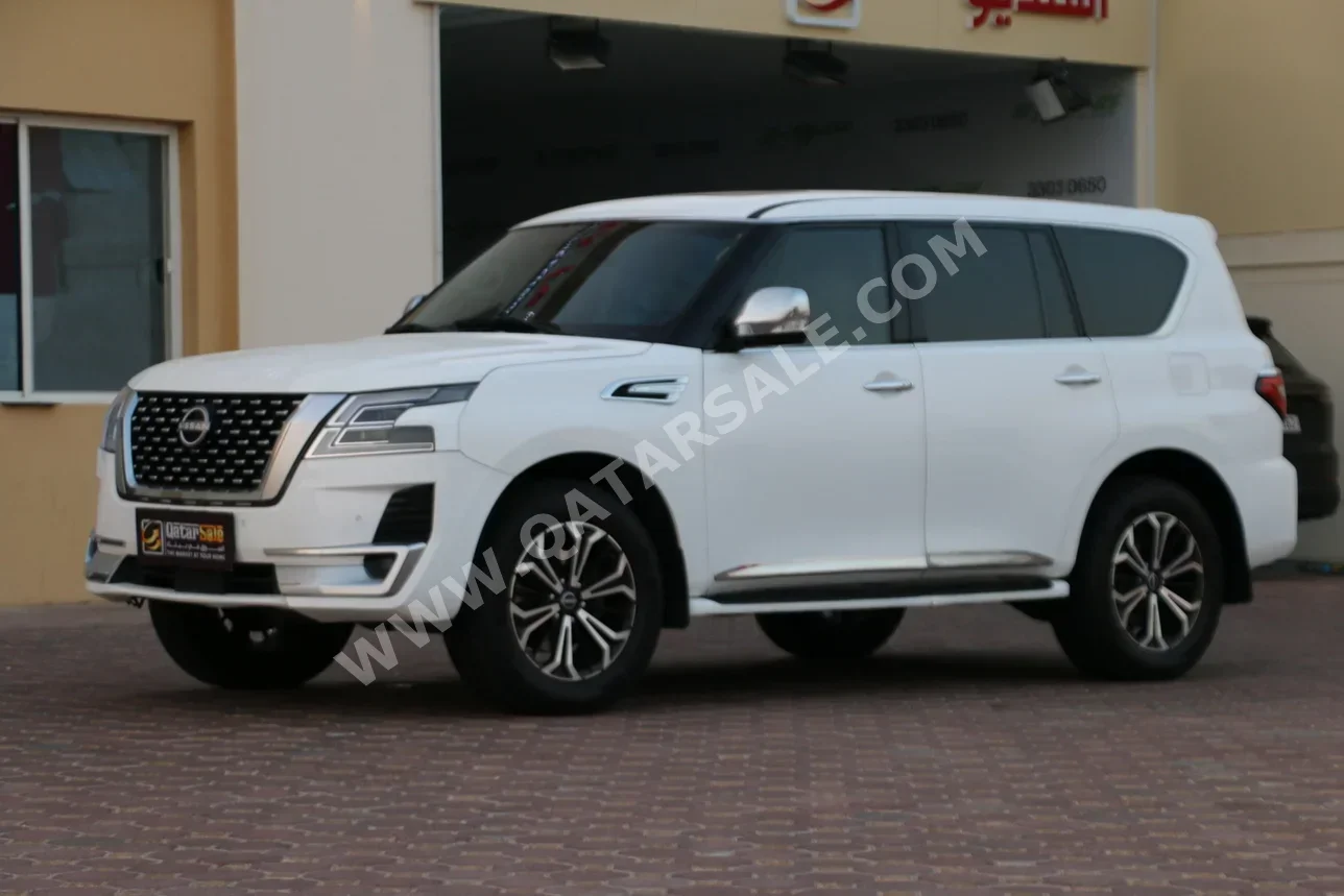Nissan Patrol SE 2013 Automatic 430,000 Km 8 Cylinder Four Wheel Drive (4WD) SUV White
