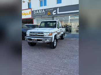 Toyota  Land Cruiser  LX  2023  Manual  114,000 Km  6 Cylinder  Four Wheel Drive (4WD)  Pick Up  White