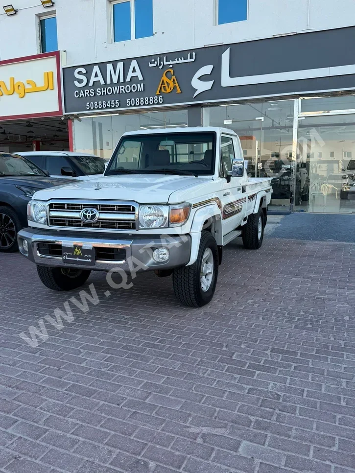 Toyota  Land Cruiser  LX  2023  Manual  114,000 Km  6 Cylinder  Four Wheel Drive (4WD)  Pick Up  White