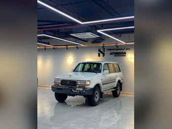 تويوتا لاند كروزر جي اكس ار 1997 عادي 255,000 كم 6 سلندر دفع رباعي اس يو في أبيض