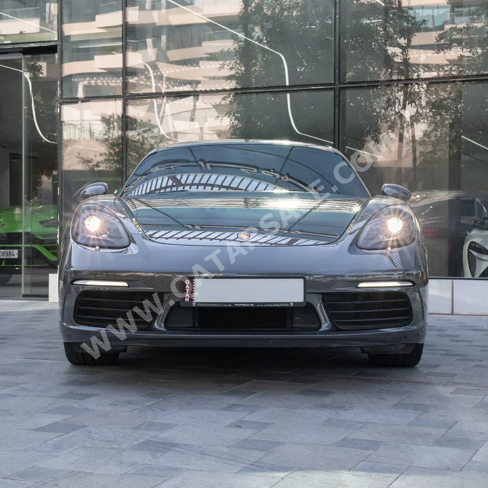 Porsche  Cayman  718  2021  Automatic  39,500 Km  4 Cylinder  Rear Wheel Drive (RWD)  Coupe / Sport  Gray  With Warranty