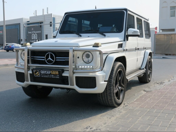 مرسيدس - بنز  جي - كلاس  63 اي ام جي  2015  اوتوماتيك  290,000 كم  8 سلندر  دفع رباعي  اس يو في  أبيض