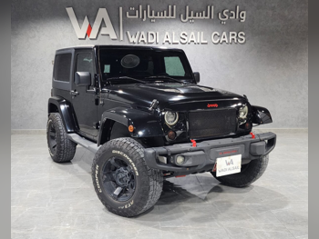 جييب رانجلار سبورت 2013 اوتوماتيك 163,000 كم 6 سلندر دفع رباعي اس يو في أسود