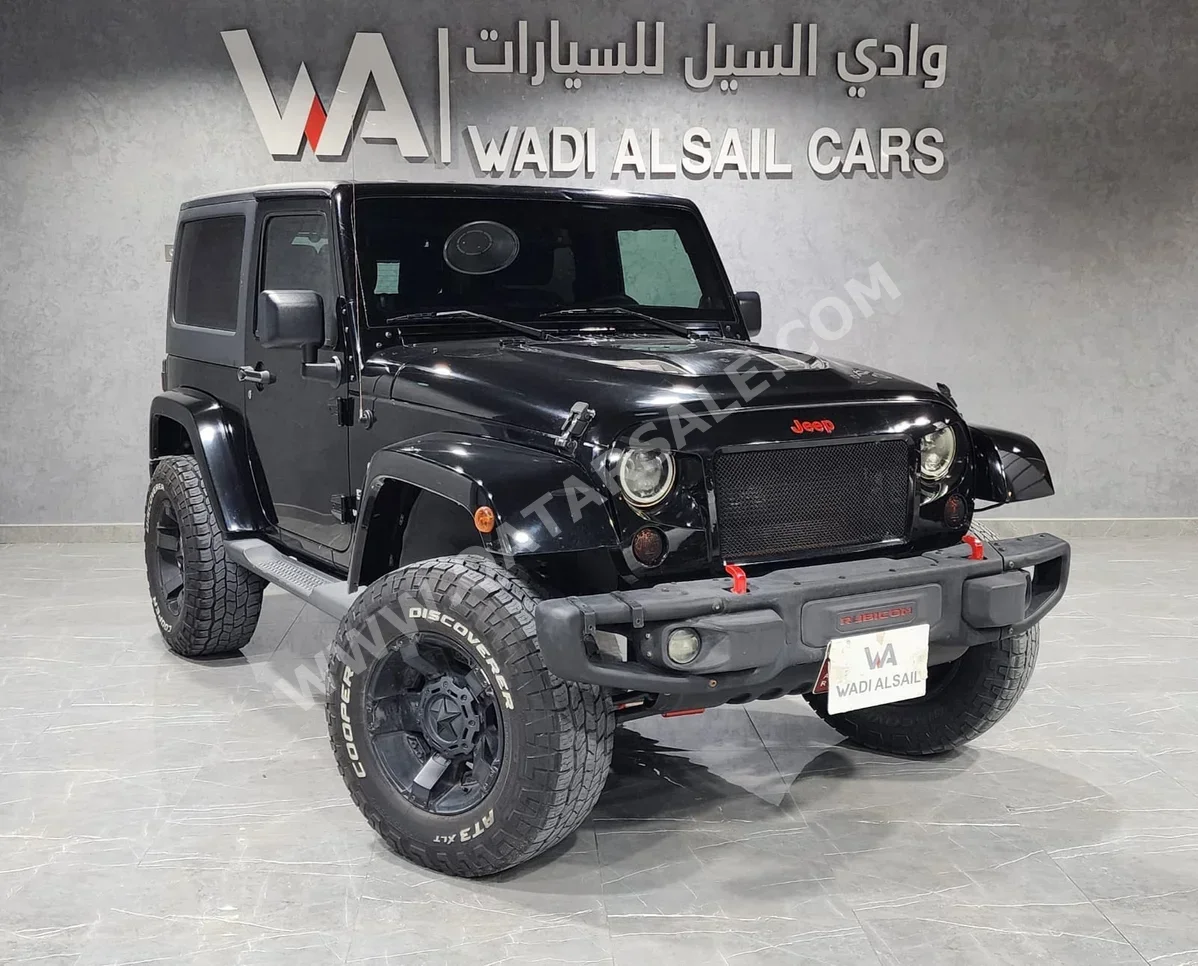 جييب رانجلار سبورت 2013 اوتوماتيك 163,000 كم 6 سلندر دفع رباعي اس يو في أسود
