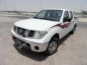 Nissan  Navara  2012  Manual  150,000 Km  4 Cylinder  Rear Wheel Drive (RWD)  Pick Up  White  With Warranty