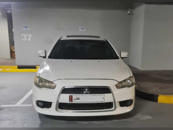 Mitsubishi  Lancer  GT  2015  Automatic  180,000 Km  4 Cylinder  Front Wheel Drive (FWD)  Sedan  White