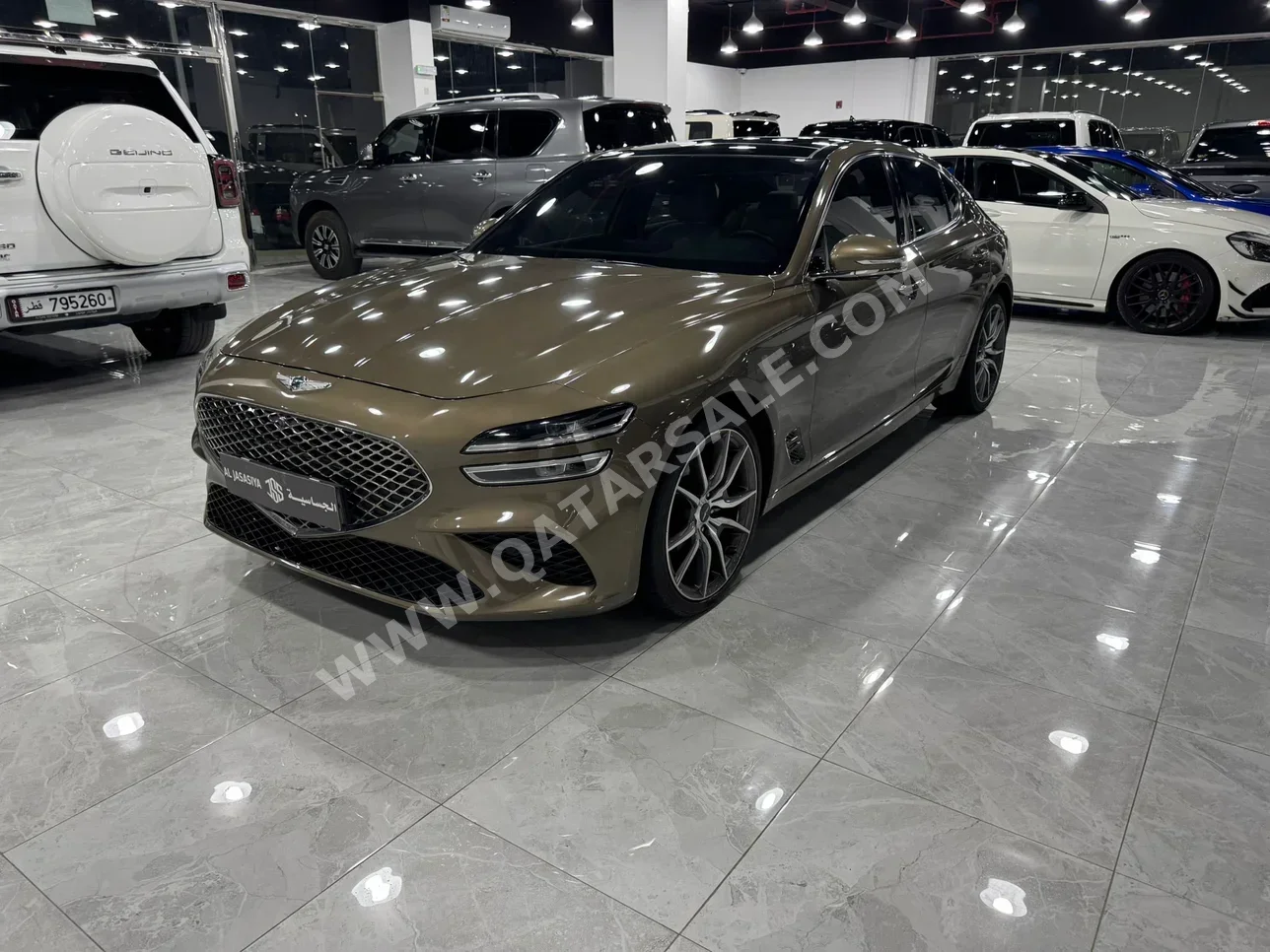 جينيسيس جي 70 2023 اوتوماتيك 30,000 كم 6 سلندر دفع خلفي سيدان بني تحت الضمان