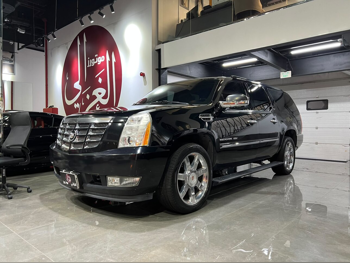Cadillac  Escalade  2012  Automatic  90,000 Km  8 Cylinder  Four Wheel Drive (4WD)  SUV  Black
