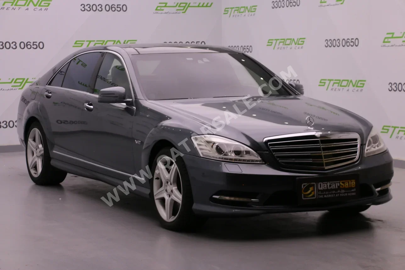 مرسيدس - بنز  اس - كلاس  600 AMG  2010  اوتوماتيك  62,000 كم  12 سلندر  دفع خلفي  سيدان  رمادي