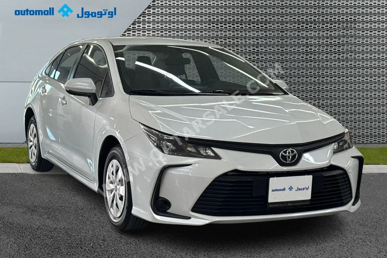 Toyota  Corolla  2023  Automatic  64,001 Km  4 Cylinder  Front Wheel Drive (FWD)  Sedan  White  With Warranty