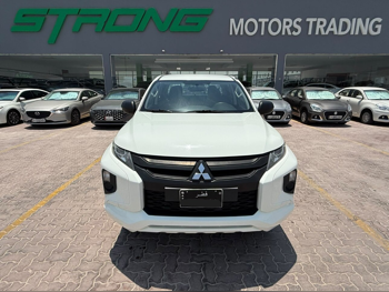 Mitsubishi  L 200  Diesel  2023  Manual  163,000 Km  4 Cylinder  Four Wheel Drive (4WD)  Pick Up  White