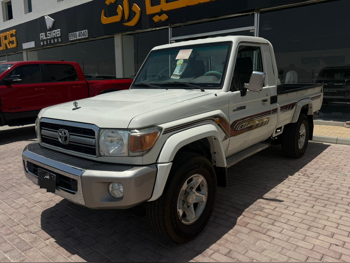 تويوتا  لاند كروزر  ال اكس  2018  عادي  247,000 كم  6 سلندر  دفع رباعي  بيكب  أبيض