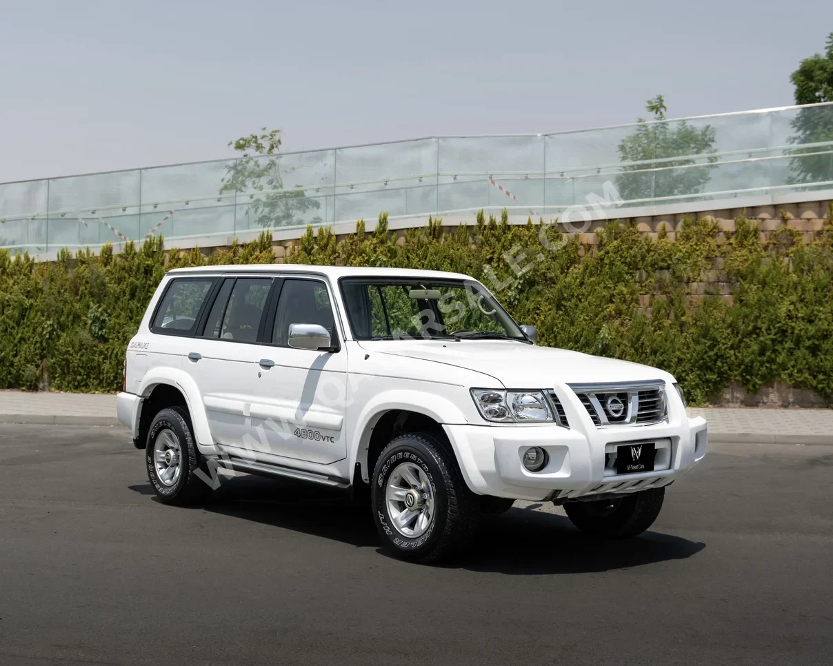 نيسان  باترول  سفاري  2002  اوتوماتيك  405,000 كم  6 سلندر  دفع رباعي  اس يو في  أبيض