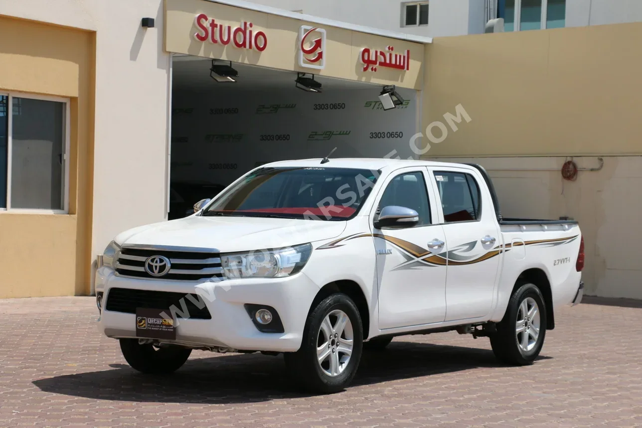 Toyota  Hilux  2016  Automatic  211,000 Km  4 Cylinder  Rear Wheel Drive (RWD)  Pick Up  White