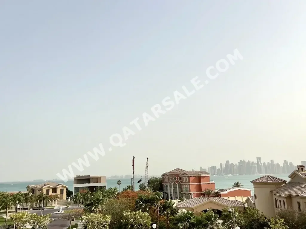 2 Bedrooms  Apartment  For Sale  in Doha -  The Pearl  Semi Furnished