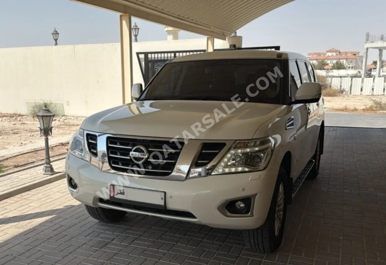 نيسان  باترول  اس اي  2018  اوتوماتيك  297,000 كم  6 سلندر  دفع رباعي  اس يو في  أبيض