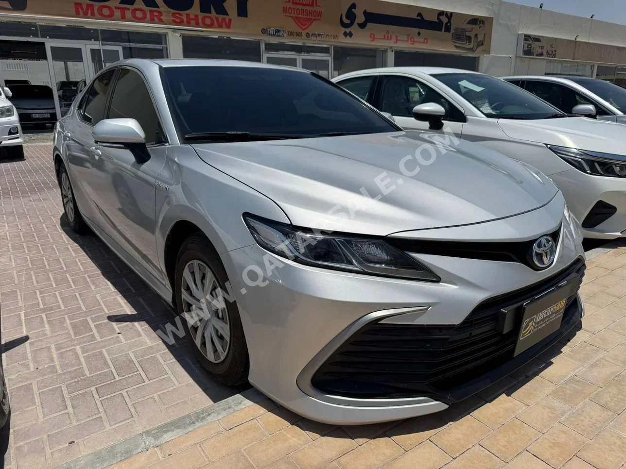 تويوتا  كامري  أل اي  2022  اوتوماتيك  310,000 كم  4 سلندر  سحب امامي  سيدان  فضي