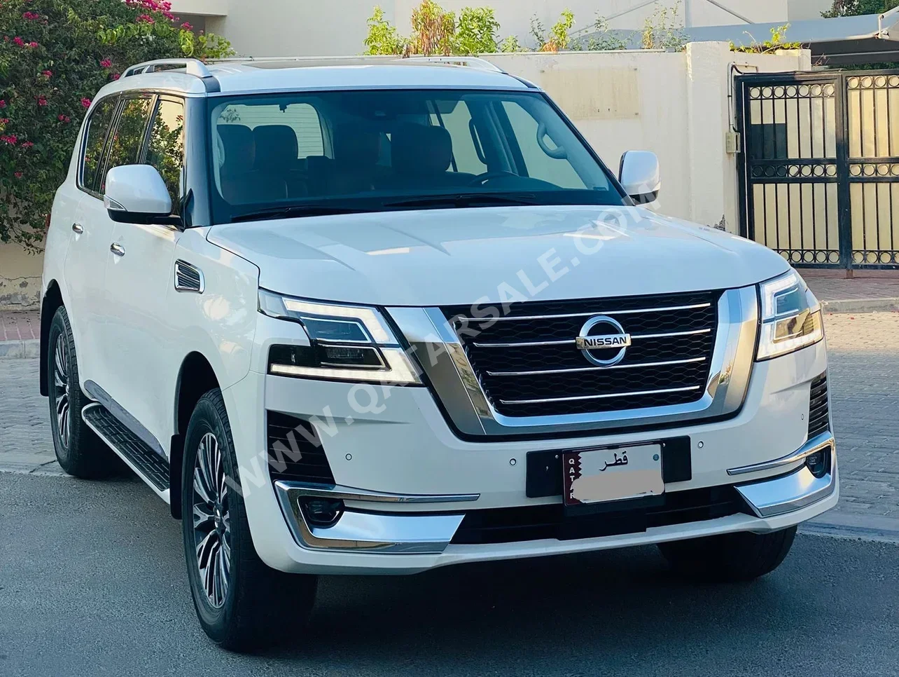 Nissan  Patrol  Titanium  2020  Automatic  99,000 Km  8 Cylinder  Four Wheel Drive (4WD)  SUV  White