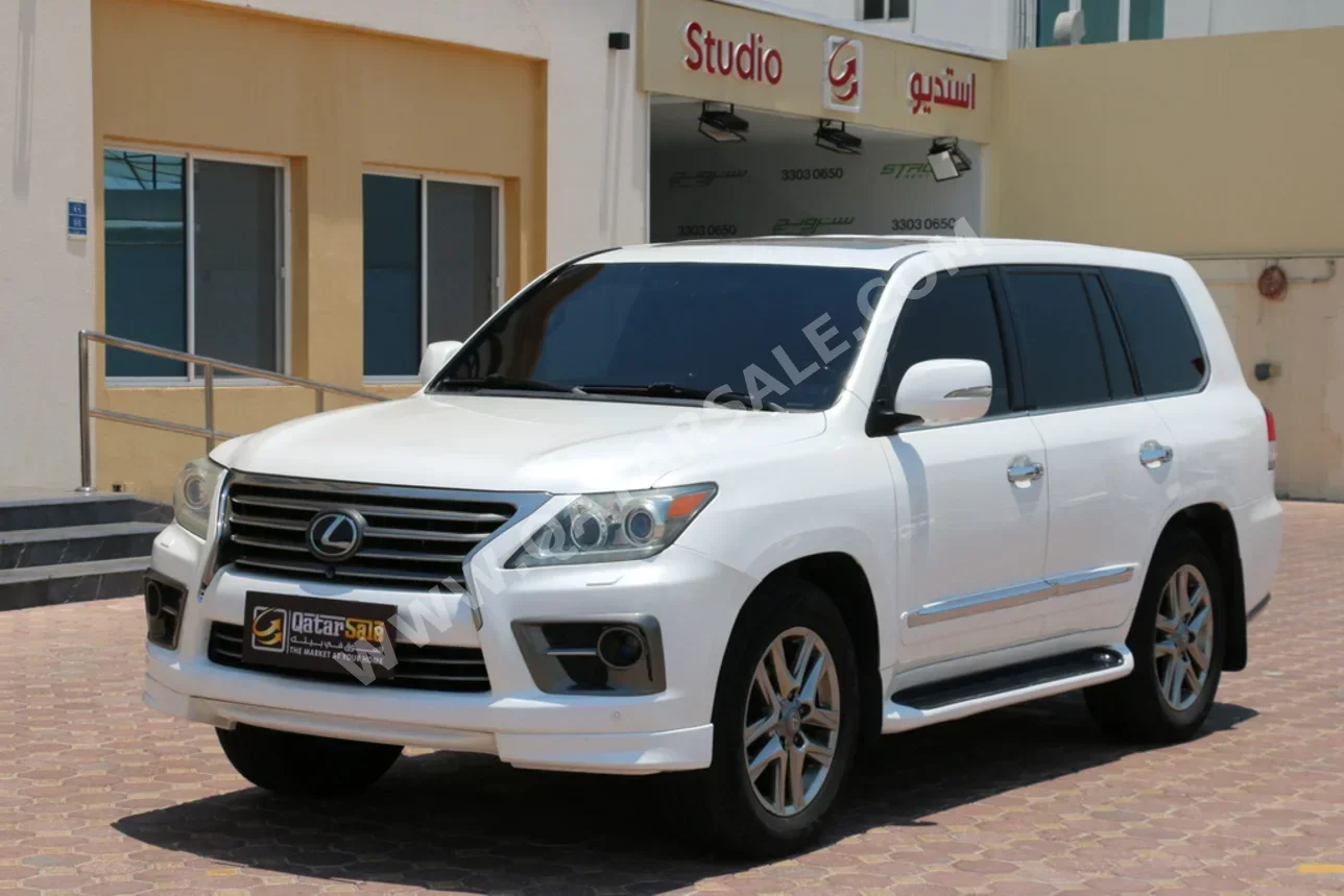 Lexus  LX  570 S  2014  Automatic  291,000 Km  8 Cylinder  Four Wheel Drive (4WD)  SUV  Pearl