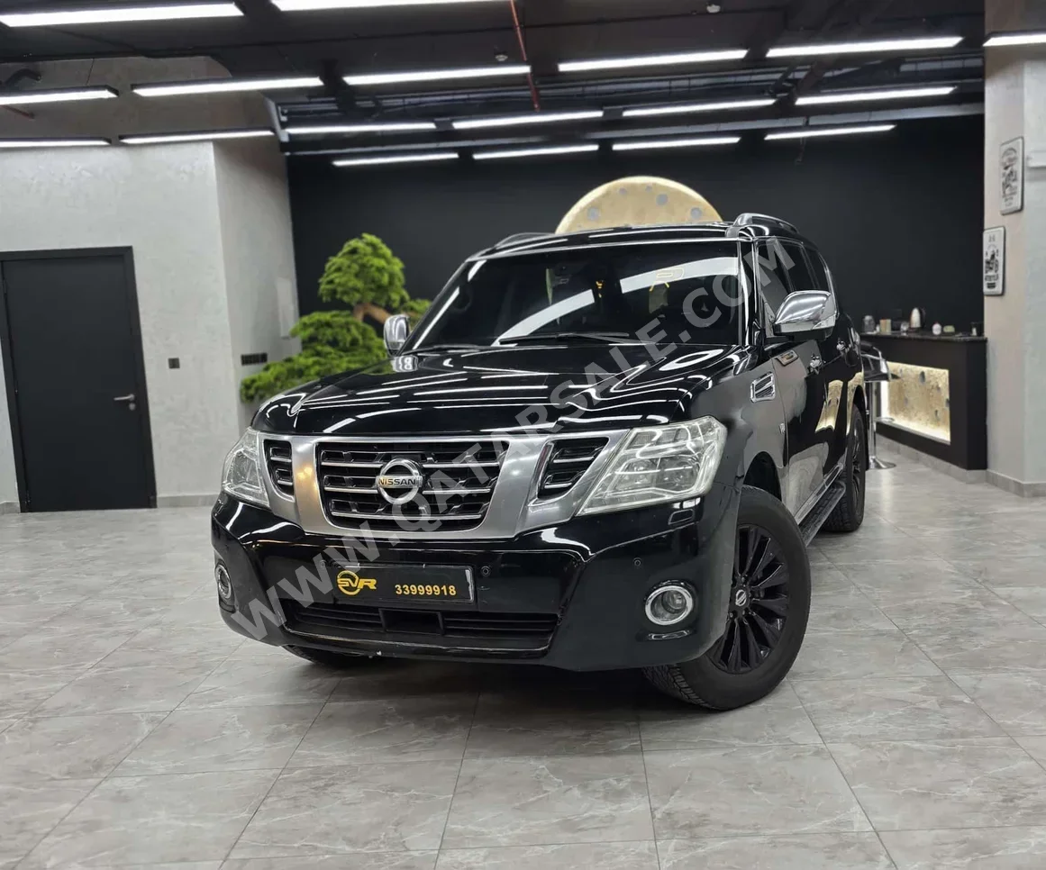 Nissan  Patrol  Platinum  2014  Automatic  236,000 Km  8 Cylinder  Four Wheel Drive (4WD)  SUV  Black
